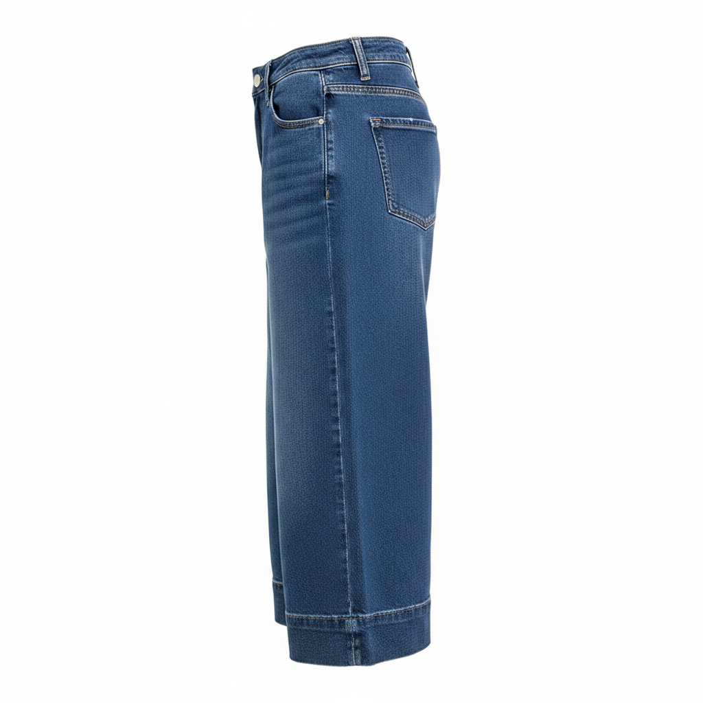 Women's wide-leg denim culottes side profile cuffed hem silhouette blue wash