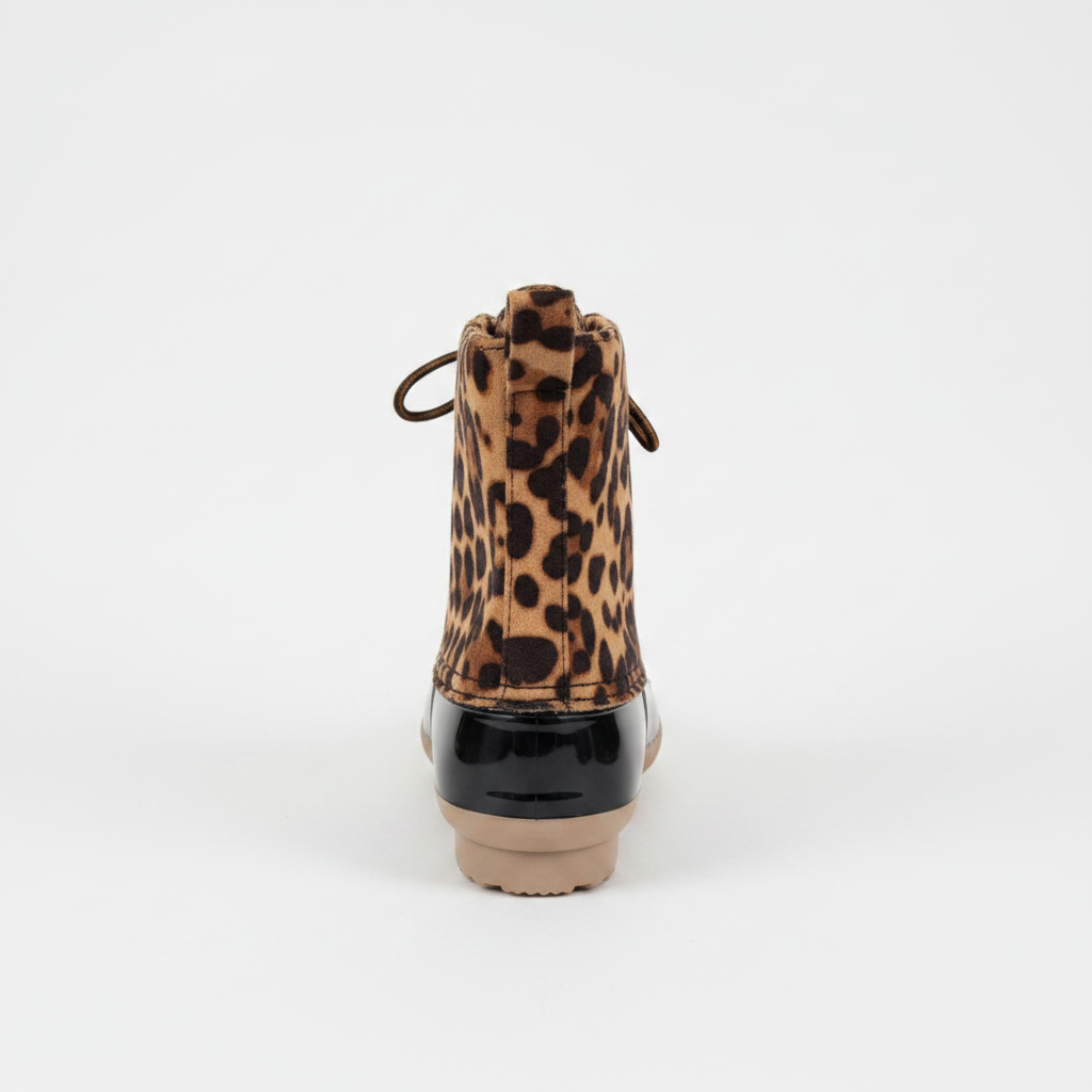 Women's leopard print duck boot back view showing pull tab, black rubber heel, and cream lug sole - Yoki