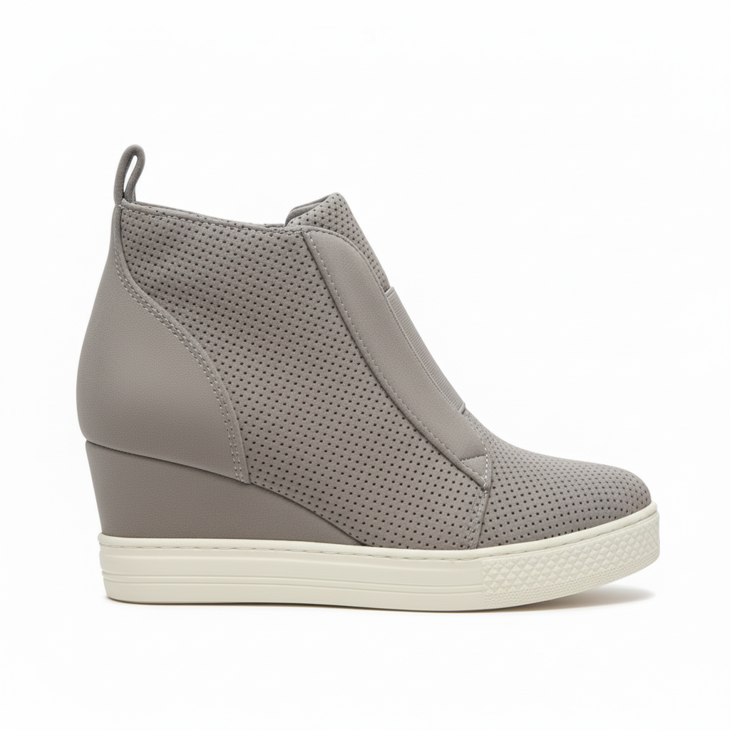 Women's grey perforated slip-on wedge sneaker with hidden heel and side zipper closure
