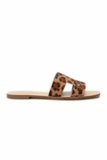 Women's leopard print slide sandal side view showing wide cutout upper band