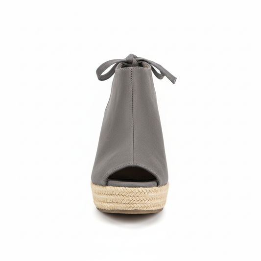 Grey espadrille wedge sandal with ankle tie - front view on white background