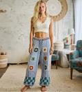 POL Clothing Blue Multi wide-leg knit pants on model, full-length front view, bright boho interior
