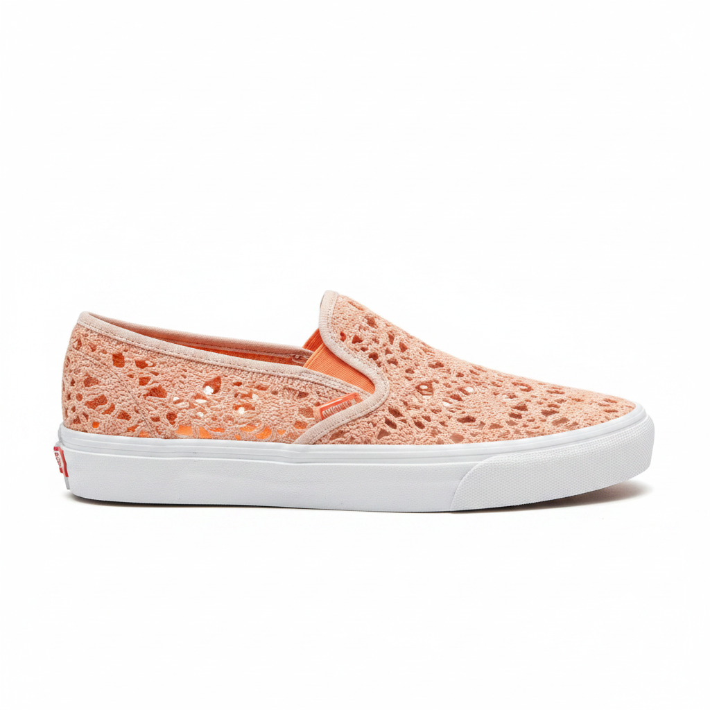 Women's peach crochet slip-on sneaker side profile view, open mesh upper and white sole, white background