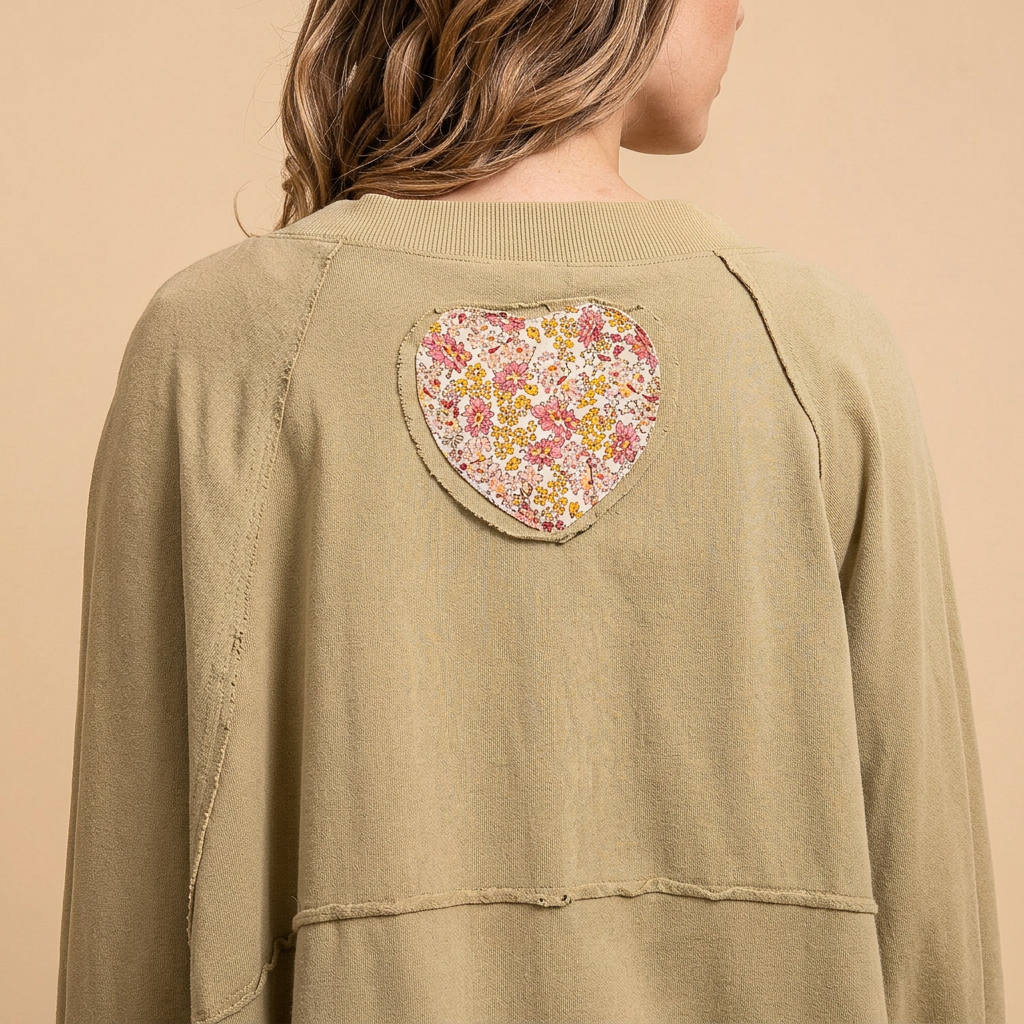 Blue Velvet sage heart patchwork sweatshirt back view showing the floral heart patch