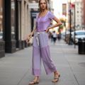POL women's dusty lilac wide-leg cropped pants with diagonal patchwork panels, boutique street style walk