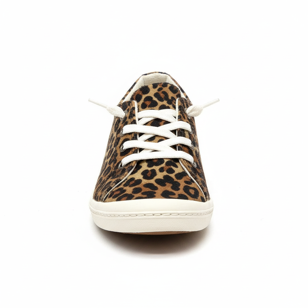 Leopard print sneaker with white laces on a white background