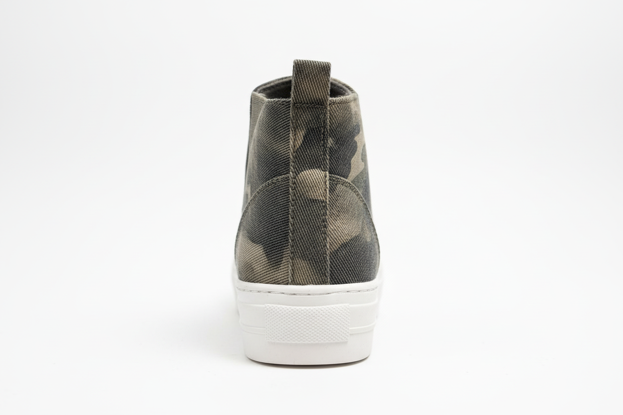 Camouflage-patterned sneaker on a white background
