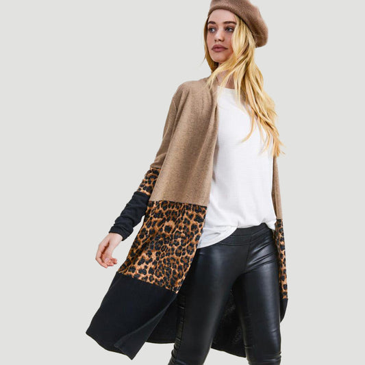 Take the comfy vibes of your living room out to concerts and cafes with this leopard-print cardigan. Keep warm and look great on late-night adventures, travels, and more with pockets and cashmere material. It's the perfect stylish, cozy cover-up for any occasion - crafted with both style and comfort in mind