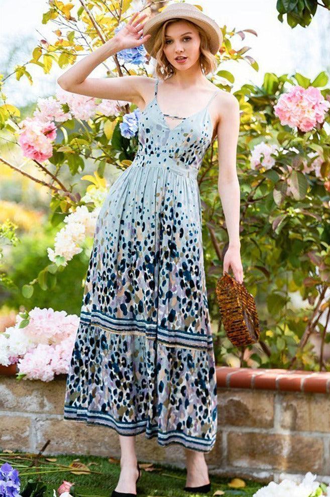 Woman, it's time to get Boho-licious... in this abstract brush print maxi dress with a cutout neckline and open-back cami sleeveless.