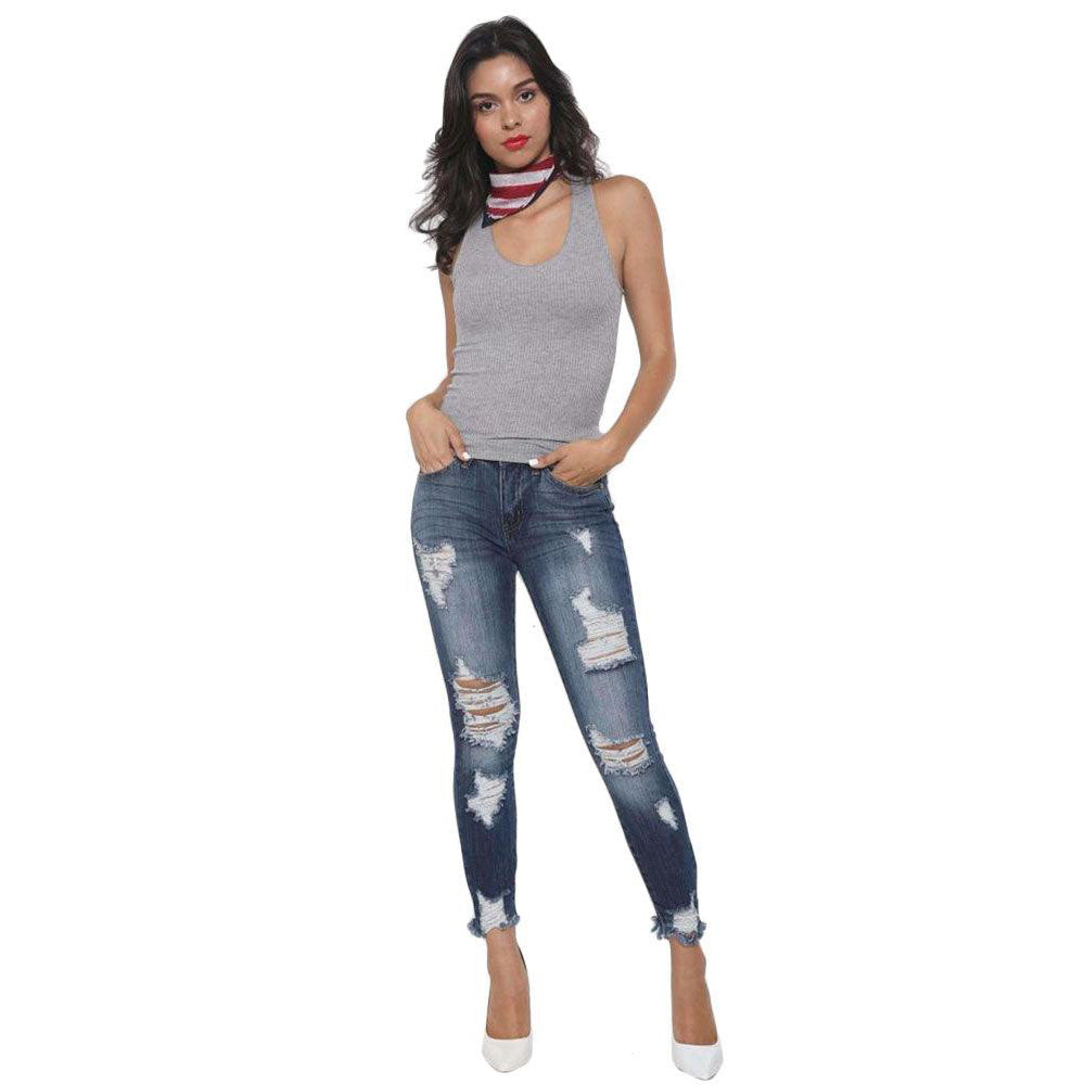 Experience awesome style with Women's Ankle Distressed Skinny Dark Wash Jeans! Featuring an 8.5" Front Rise and 27" Inseam, you'll be rocking a fashionable look all day! These jeans provide a timeless look that flaunts your style.