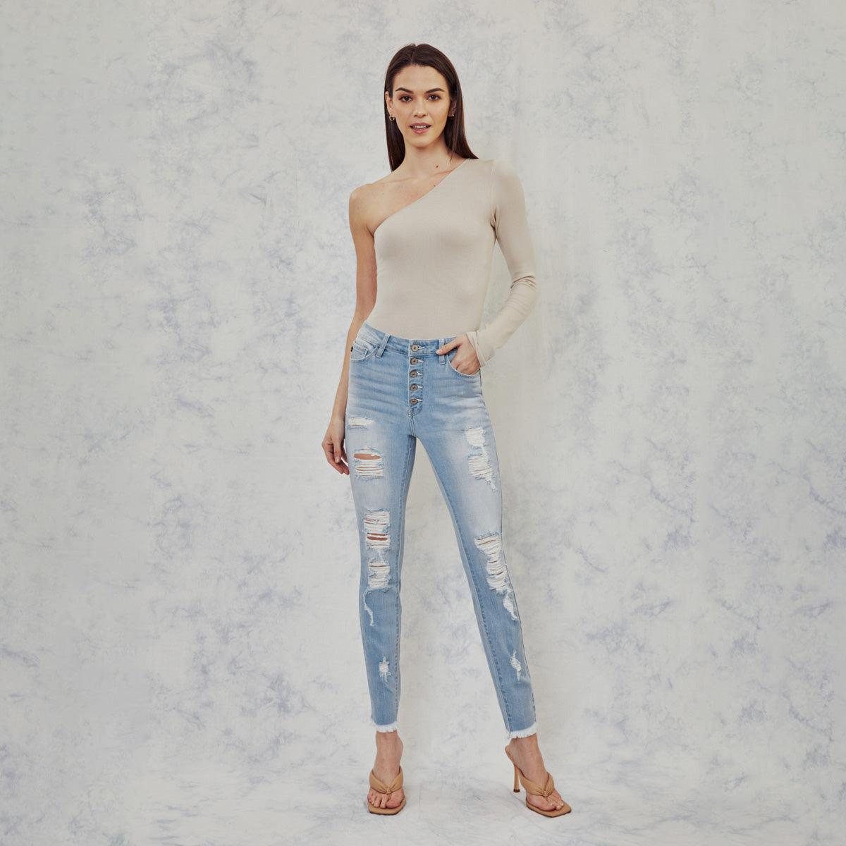 These skinny skinnies are crafted from stretchably snuggly denim, distressed with love, and rockin' a raw hem for a totally "lived-in" vibe. Our Lola High Rise Super Skinny Jeans have a high-waist fit that hugs the body all the way down to the ankle. These jeans feature a classic 5-pocket design, one-button front, and zippy closure. And they come in light, medium, and dark washes.