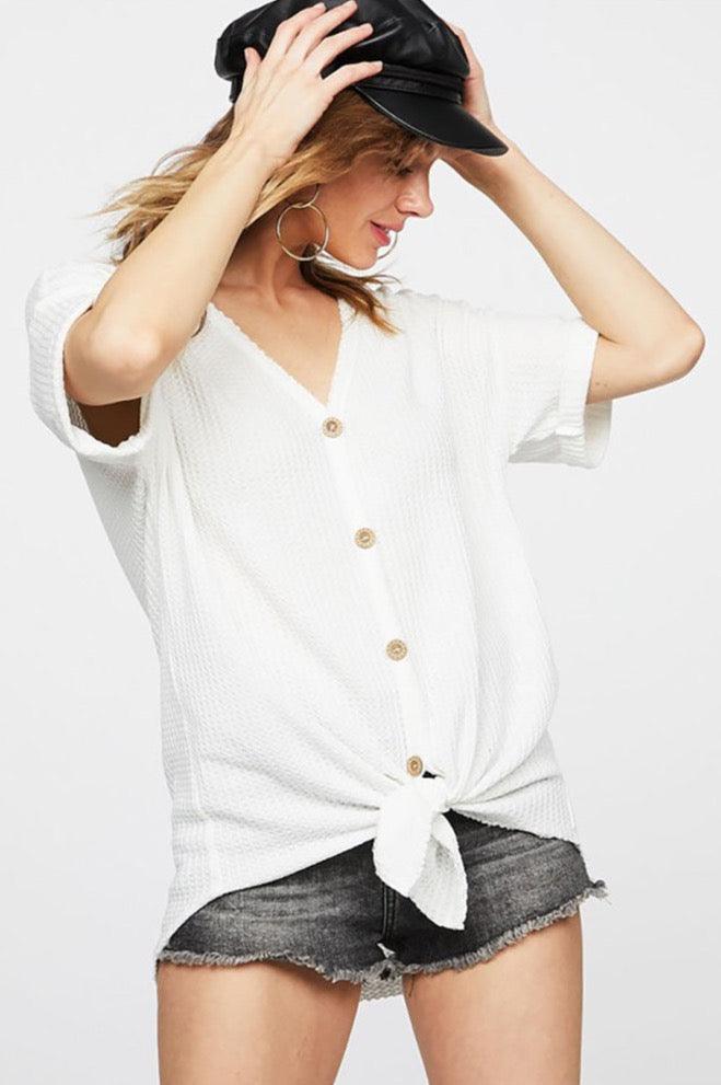 Rock this chic Women's Thermal Waffle Short Sleeve Buttoned Front Top and feel fabulous! Show off your unique style in this stylish top - it's toasty, trendy, and totally perfect for any occasion.