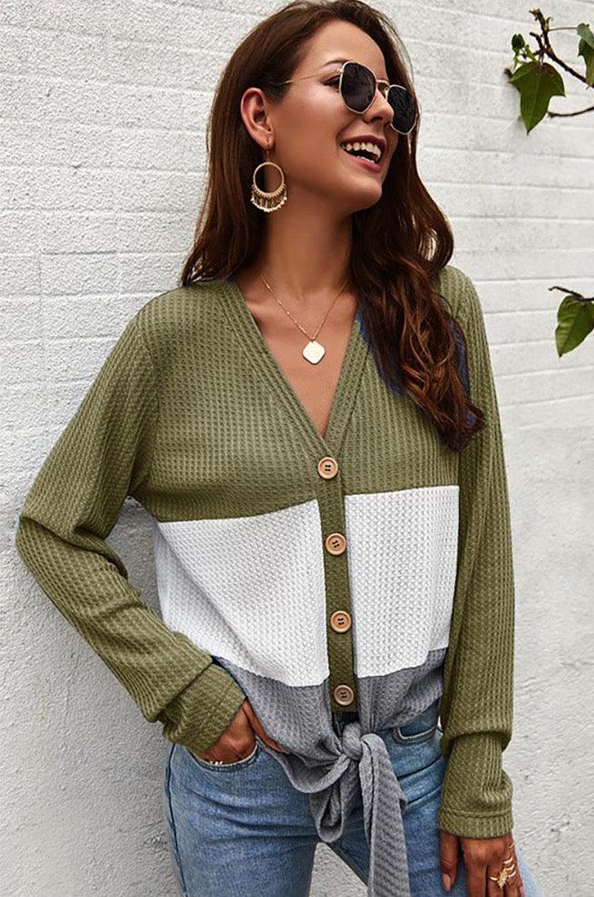Women's Tie Button-Down Long Sleeve Top - a fab fabric with bold stripe contrast knit, that's lightweight and top-notch. Traditional seaming and oversized buttons keep it classic. 